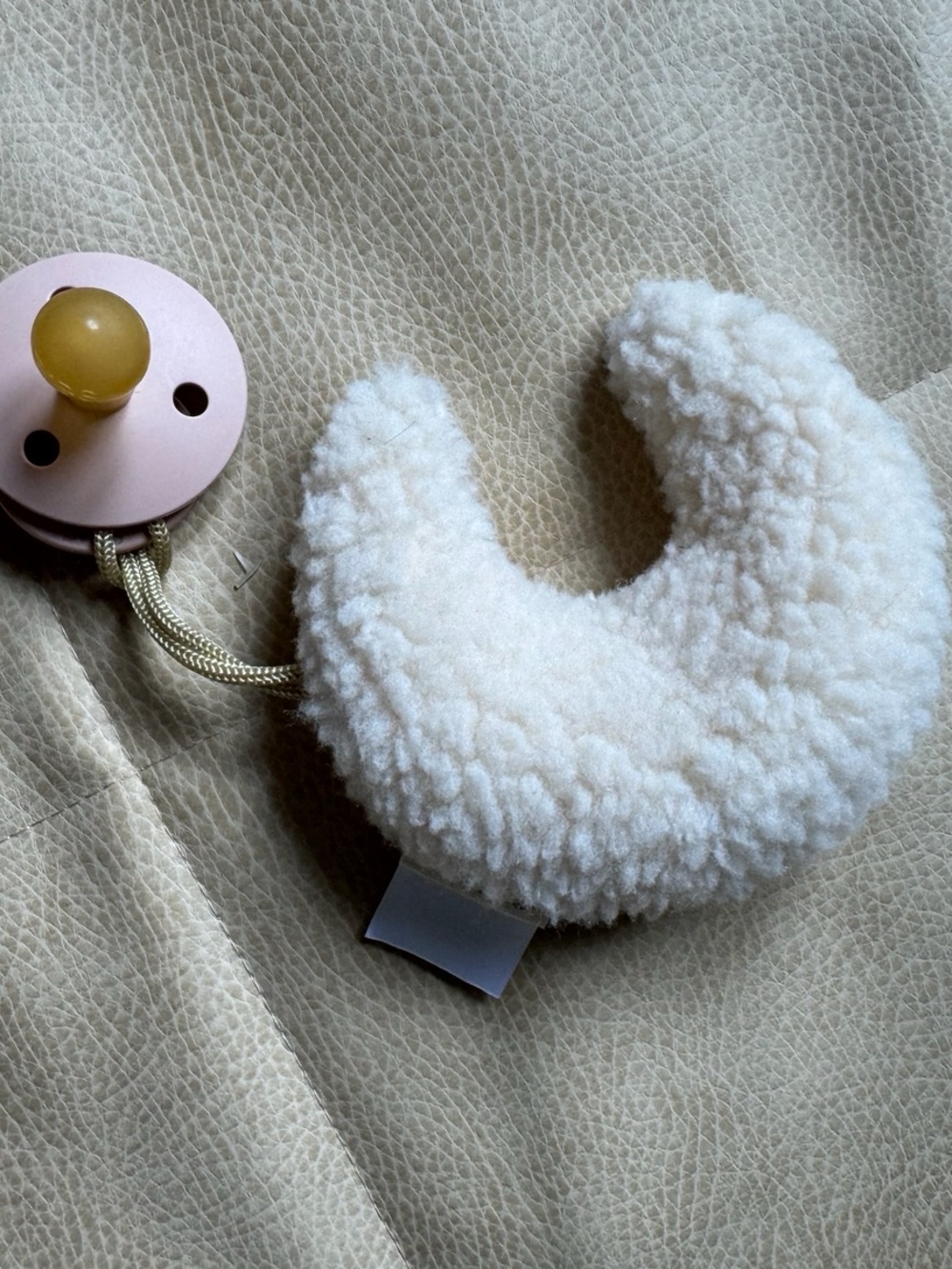 Itzy Ritzy Cream Sherpa Crescent Pacifier Clip